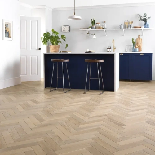 Stylish herringbone flooring in kitchen