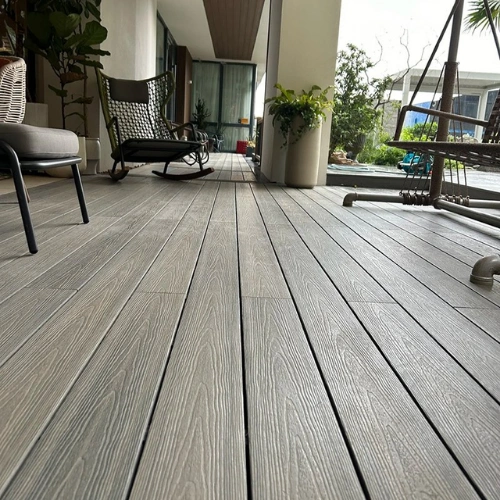 Dark brown WPC decking installed on outdoor patio