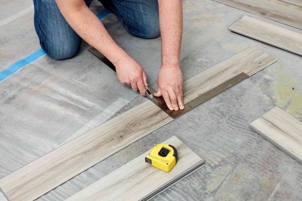 SPC flooring plank cutting installation